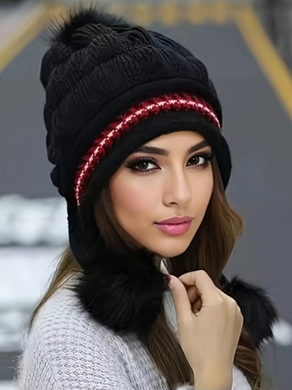 Adorable Black Pom-Pom Winter Beanie with Red Trim